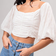 BLUSA SEMI AMPLIA MANGA CORTA CARTAS