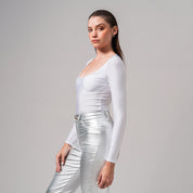 BLUSA AJUSTADA CORTA MANGA LARGA MANCHA