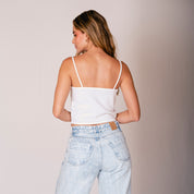 BLUSA AJUSTADA CORTA TIRAS TRUCO