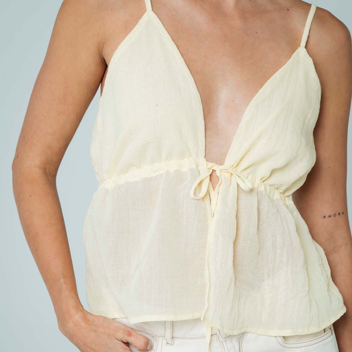 BLUSA SEMI AMPLIA TIRAS BRAN