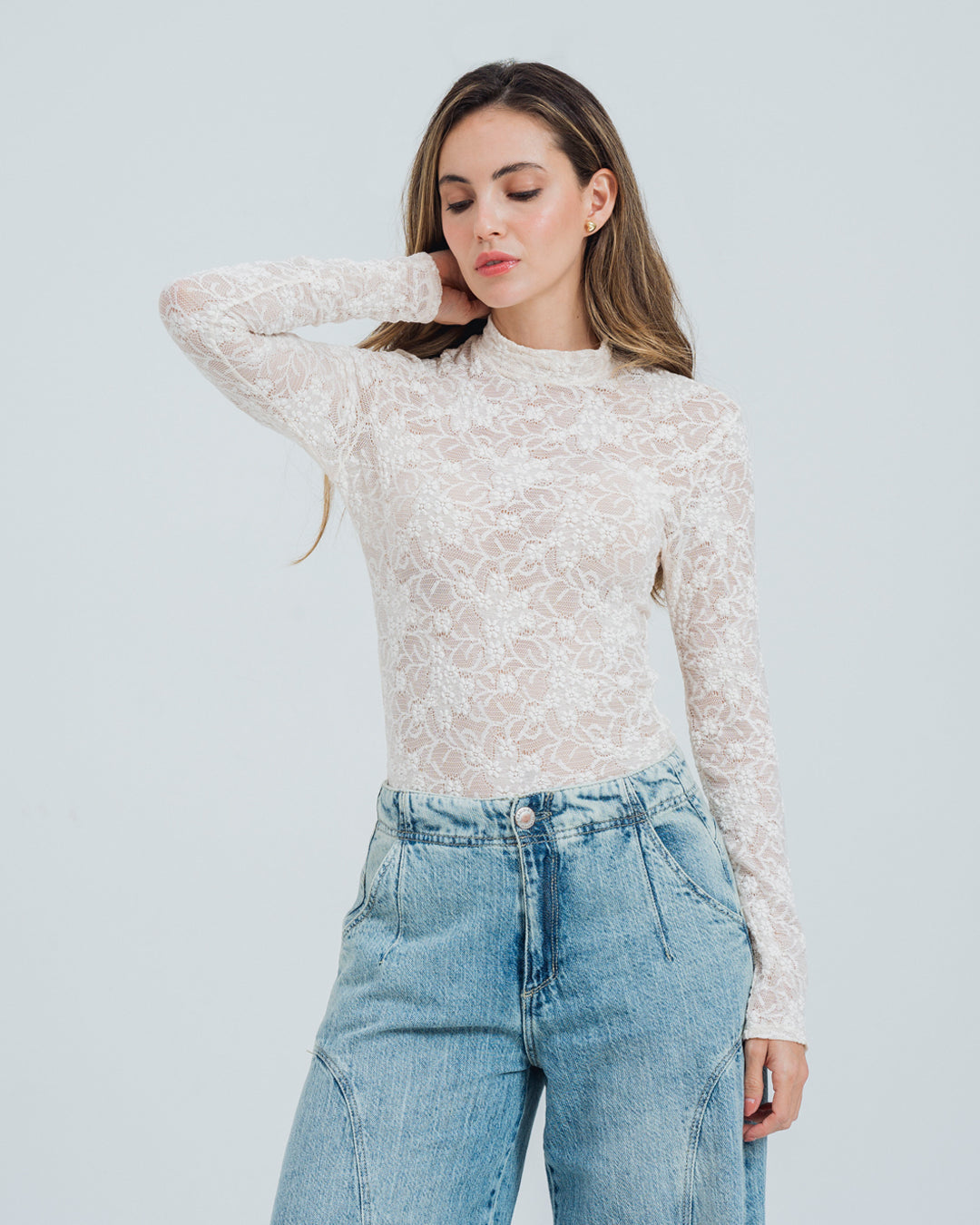 BLUSA AJUSTADA MANGA LARGA PLUNI