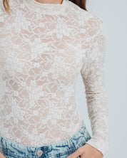 BLUSA AJUSTADA MANGA LARGA PLUNI