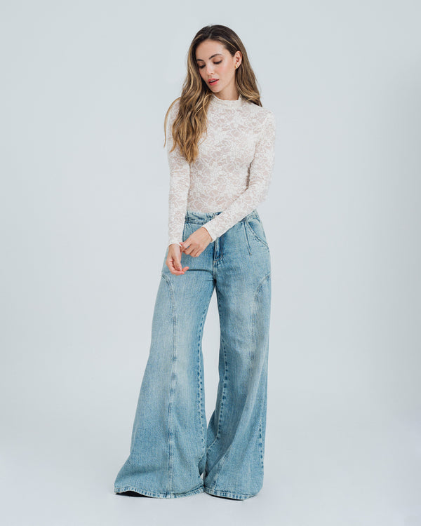 BLUSA AJUSTADA MANGA LARGA PLUNI