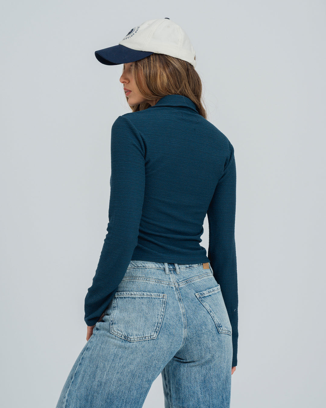 BLUSA AJUSTADA MANGA LARGA PLEIT
