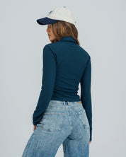 BLUSA AJUSTADA MANGA LARGA PLEIT
