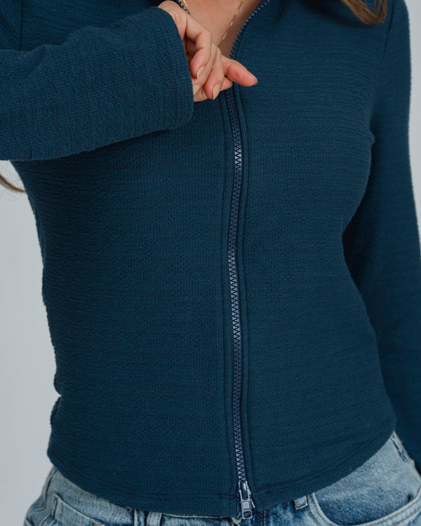 BLUSA AJUSTADA MANGA LARGA PLEIT