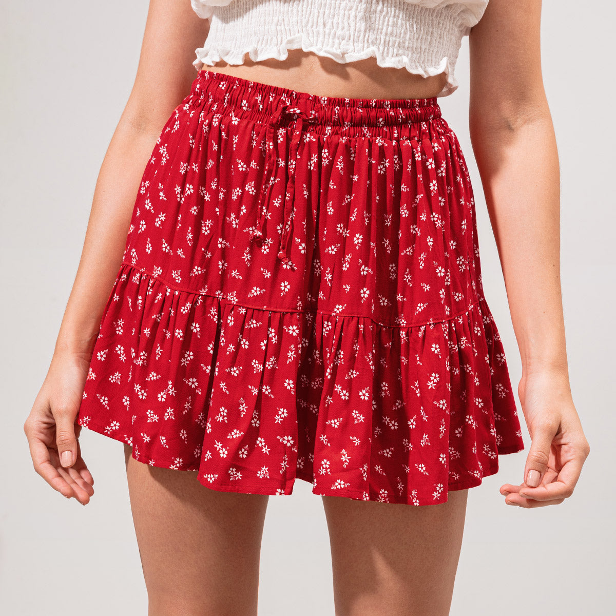 FALDA LINEA A CORTA TALLE ALTO BLOSSOM