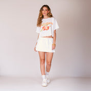 FALDA LINEA A CORTA TALLE MEDIO LEÑA