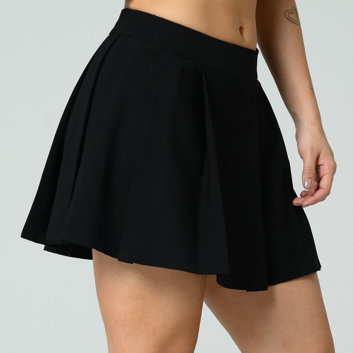 FALDA CORTA TALLE MEDIO RUDE